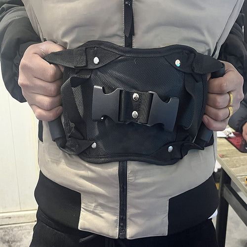 Passenger belt worn over a riding jacket
